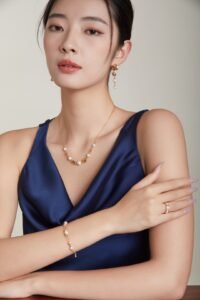 Layered molten gold necklace with matching earrings and bracelet