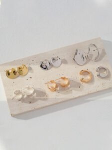 Antique gold plated textured earrings with casual outfit