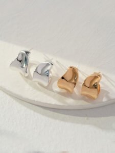 Close-up of micro-textured surface on silver earrings