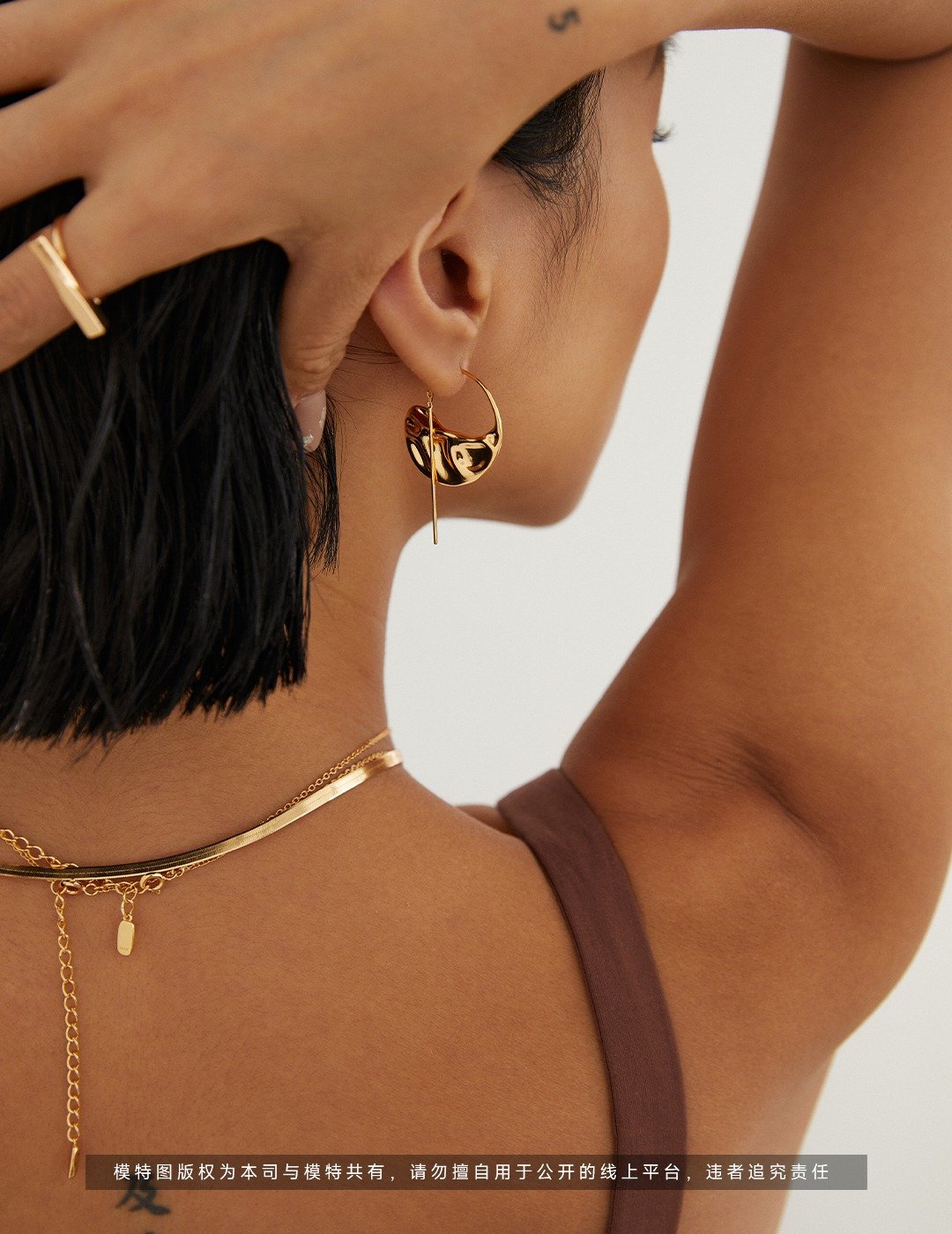 White gold polished moon drop earrings on model