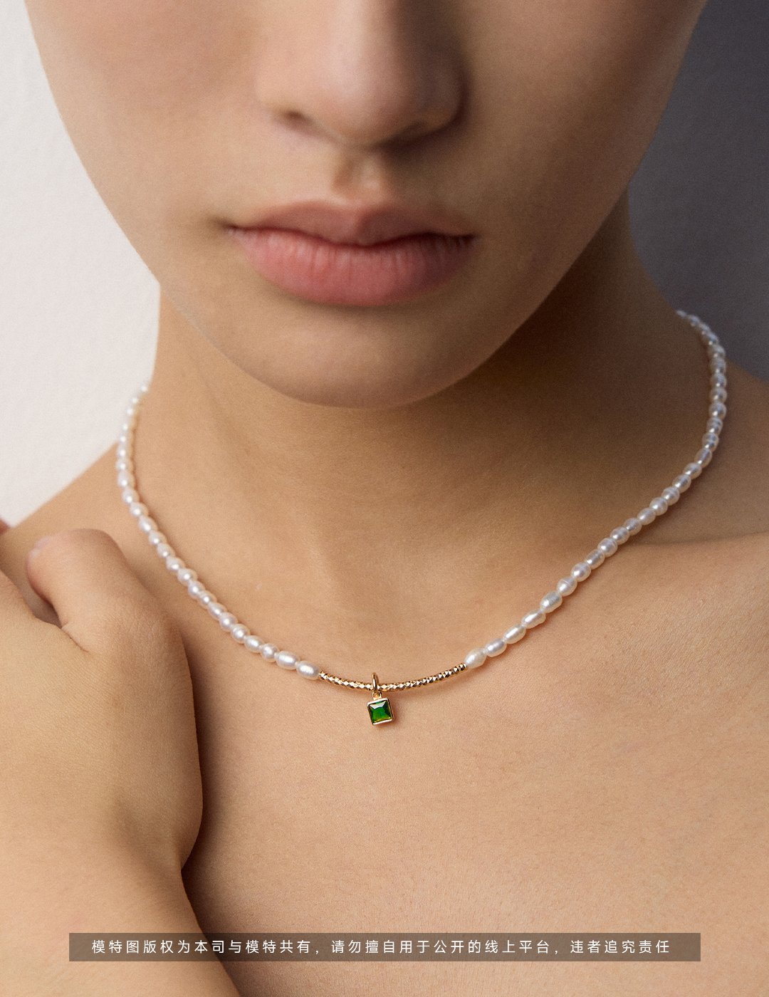 Sterling silver oval pearl necklace with green zirconia pendant