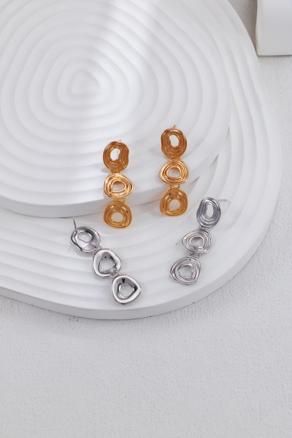 S925 silver and gold spiral drop earrings with wavy abstract design